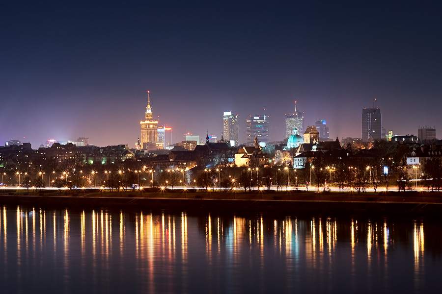 Warsaw by night (public domain)